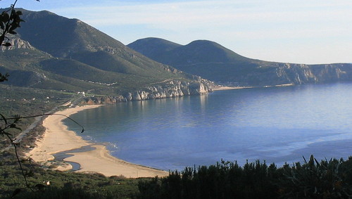 Playa de Portixeddu con Bugerru al fondo